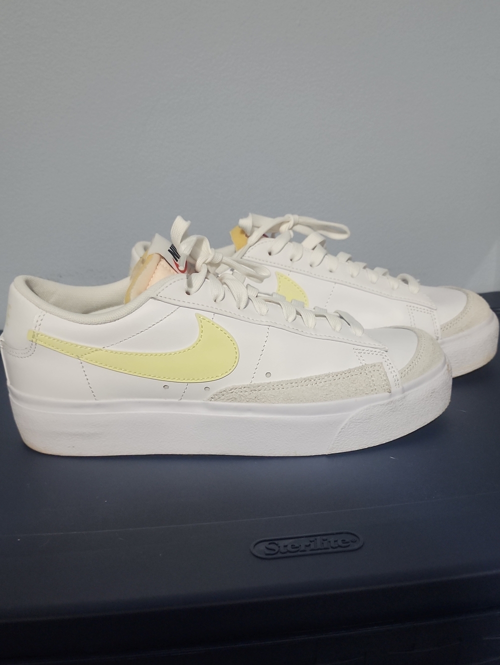 Nike Women’s White Sneakers with Pale Yellow Swoosh